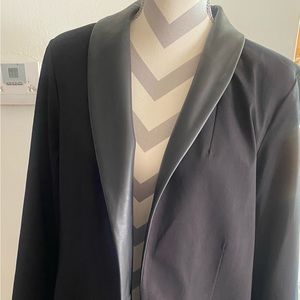 Plus size, 18W black blazer with two front pockets and faux leather.